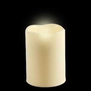 A luminessence Luminessence Battery-Operated Ivory Wax LED Pillar Candles, 3x4 in.