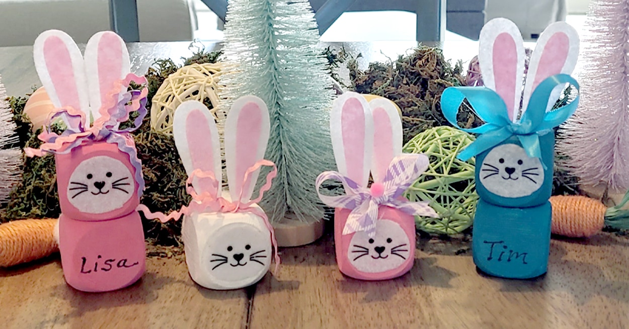 4 Easter bunny decorations made from wooden cubes, painted pink, white